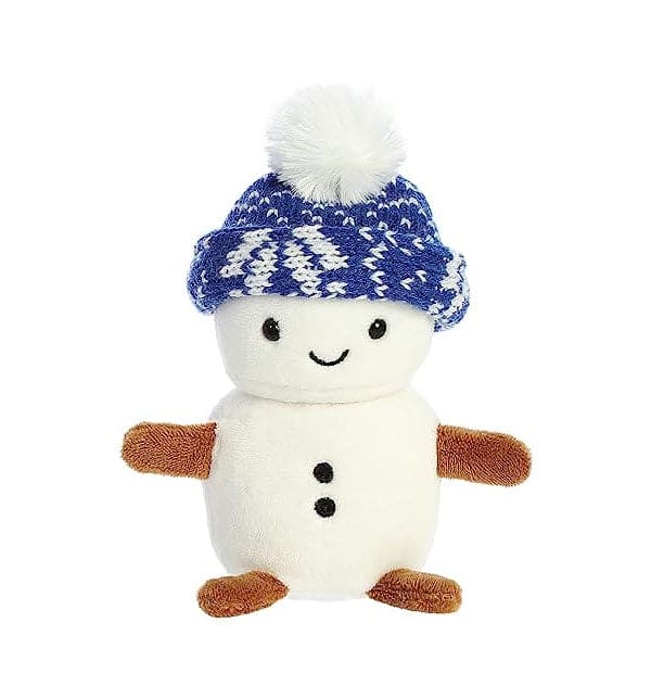 A stuffed snowman wearing a blue knitted hat. The snowman is white with black eyes and a orange carrot nose.