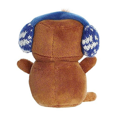 A brown plush gingerbread man with blue ear muffs and a red hat with white trim.