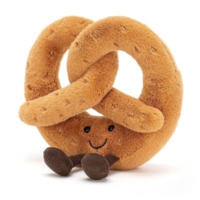 Brown plush pretzel with smiley face