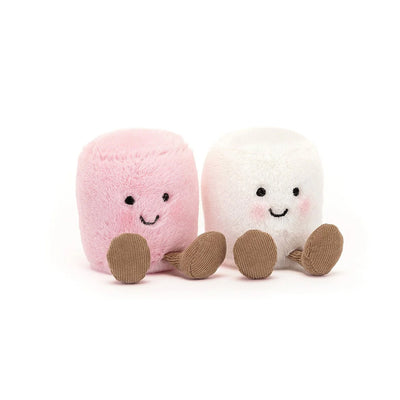 Pink and white plush marshmallows with black button eyes and stitched smiles.