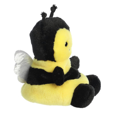 Yellow plush chick with orange beak and black button eyes