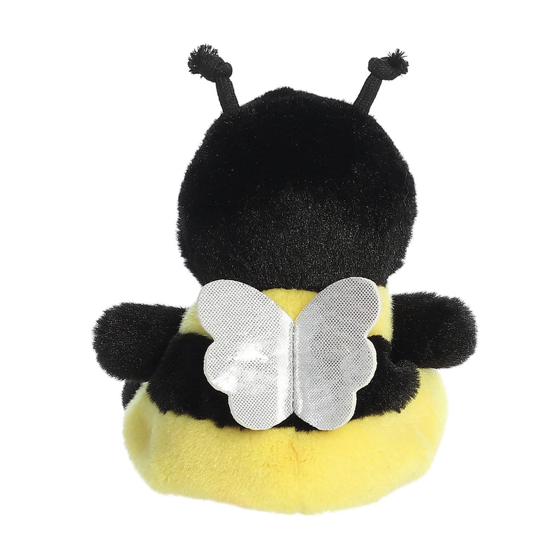 Yellow plush chick with orange beak and black button eyes