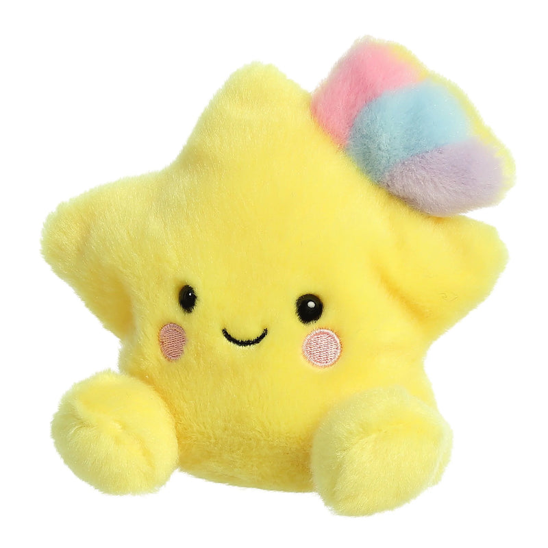 Yellow stuffed star toy with rainbow colored tail and smiley face